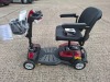 GENIUS AS TRAVELLER MOBILITY SCOOTER IN RED / BLACK WITH BATTERY & CHARGER 12 MILE RANGE - MAX SPEED 4/6 MPH RRP &pound; 1,695 CONDITION - GOOD (TESTED WORKING & SEE ALL IMAGES FOR CONDITION ) - 6