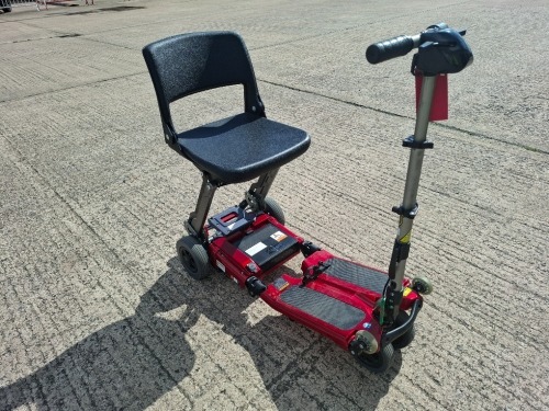 LUGGIE FOLDING MOBILITY SCOOTER IN RED NO CHARGER - TESTED WORKING WITH CHARGE REMAINING IN BATTERY CONDITION GOOD ( SEE ALL IMAGES FOR CONDITION )