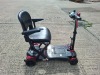 AUTO - FOLD 4 WHEEL ELECTRIC SCOOTER IN BLACK / RED NO CHARGER - TESTED WORKING WITH CHARGE REMAINING IN BATTERY CONDITION GOOD ( SEE ALL IMAGES FOR CONDITION ) - 5