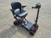 AUTO - FOLD 4 WHEEL ELECTRIC SCOOTER IN BLACK / RED NO CHARGER - TESTED WORKING WITH CHARGE REMAINING IN BATTERY CONDITION GOOD ( SEE ALL IMAGES FOR CONDITION )