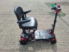 AUTO - FOLD 4 WHEEL ELECTRIC SCOOTER IN BLACK / RED NO CHARGER - TESTED WORKING WITH CHARGE REMAINING IN BATTERY CONDITION GOOD ( SEE ALL IMAGES FOR CONDITION ) - 5