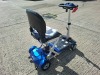 AUTO - FOLD 4 WHEEL ELECTRIC SCOOTER IN BLACK / BLUE WITH CHARGER - TESTED WORKING WITH CHARGE REMAINING IN BATTERY CONDITION GOOD ( SEE ALL IMAGES FOR CONDITION ) - 4