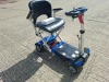 AUTO - FOLD 4 WHEEL ELECTRIC SCOOTER IN BLACK / BLUE WITH CHARGER - TESTED WORKING WITH CHARGE REMAINING IN BATTERY CONDITION GOOD ( SEE ALL IMAGES FOR CONDITION )