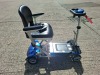 AUTO - FOLD 4 WHEEL ELECTRIC SCOOTER IN BLACK / BLUE WITH CHARGER - TESTED WORKING WITH CHARGE REMAINING IN BATTERY CONDITION GOOD ( SEE ALL IMAGES FOR CONDITION ) - 5