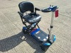 FOLDING 4 WHEEL ELECTRIC SCOOTER IN BLACK / BLUE WITH CHARGER - TESTED WORKING WITH CHARGE REMAINING IN BATTERY CONDITION FAIR ( SEE ALL IMAGES FOR CONDITION )