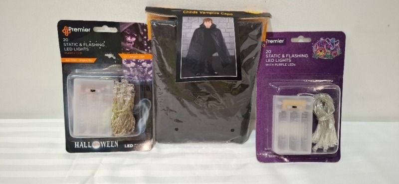 50 X BRAND NEW MIXED HALLOWEEN LOT CONTAINING BATTERY OPERATED TEA LIGHTS , CHILDS VAMPIRE CAPE , 20 STATIC & FLASHING LED LIGHTS IN PURPLE ,HALLOWEEN CAT GLASSES ETC IN ONE BOX