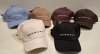 60 X BRAND NEW MENNACE BASEBALL HATS LOT CONTAINING, HATS IN BLUE, BLACK, CREAM, BROWN AND BURGUNDY, IN 2 TRAYS (TRAYS NOT INCLUDED)