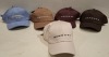 60 X BRAND NEW MENNACE BASEBALL HATS LOT CONTAINING, HATS IN BLUE, CREAM, BROWN AND BURGUNDY, IN 2 TRAYS (TRAYS NOT INCLUDED)