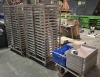 2 X STAINLESS STEEL BAKERY RACKS WITH 2 ROWS OF 18 BAKERY TRAYS, 72 EXTRA BAKERY TRAYS AND 25 SERVING LADLES - (NOTE 1 BAKERS RACK NEEDS 1 ROLLER REFITTING)