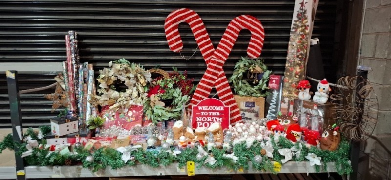 FULL BAY BRAND NEW MIXED CHRISTMAS LOT CONTAINING LED LARGE CANDY CANES , 6FT CHRISTMAS TREE WITH LIGHTS AND ACCESSORIES , LED SPIRAL TREE STAKE LIGHTS IN ICE WHITE , SANTAS DUVET SET IN SIZE SINGLE , REINDEER SLIPPERS IN SIZE 7/8 , VARIOUS CHRISTMAS WREA