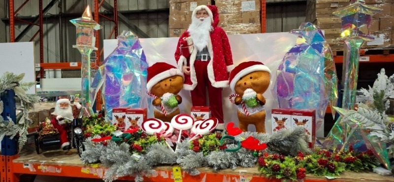 FULL BAY MIXED CHRISTMAS LOT CONTAINING STANDING INDOOR SANTA CLAUS DECORATION , PLUSH GINGERBREAD MAN HOLDING CUPCAKE AND CANDY CANE , LARGE IRIDESCENT LIGHT UP PENGUIN DECORATION , SANTA CLAUS ON MOTORBIKE DECORATION ETC - (NOTE CUSTOMER RETURNS )