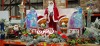 FULL BAY MIXED CHRISTMAS LOT CONTAINING STANDING INDOOR SANTA CLAUS DECORATION , PLUSH GINGERBREAD MAN HOLDING CUPCAKE AND CANDY CANE , LARGE IRIDESCENT LIGHT UP PENGUIN DECORATION , SANTA CLAUS ON MOTORBIKE DECORATION ETC - (NOTE CUSTOMER RETURNS )