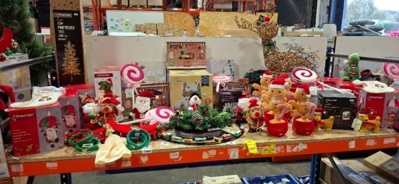FULL BAY MIXED CHRISTMAS LOT CONTAINING REINDEER LIGHT SCULPTURE , LED LIT CHRISTMAS HOUSE , PREMIER 1.5M PINE NEEDLE TREE IN WARM WHITE WITH 220 LEDS , 30CM DANCING TALKBACK GINGERBREAD MAN WITH MUSIC , ANIMATED PARACHUTING REINDEER ETC - (NOTE CUSTO