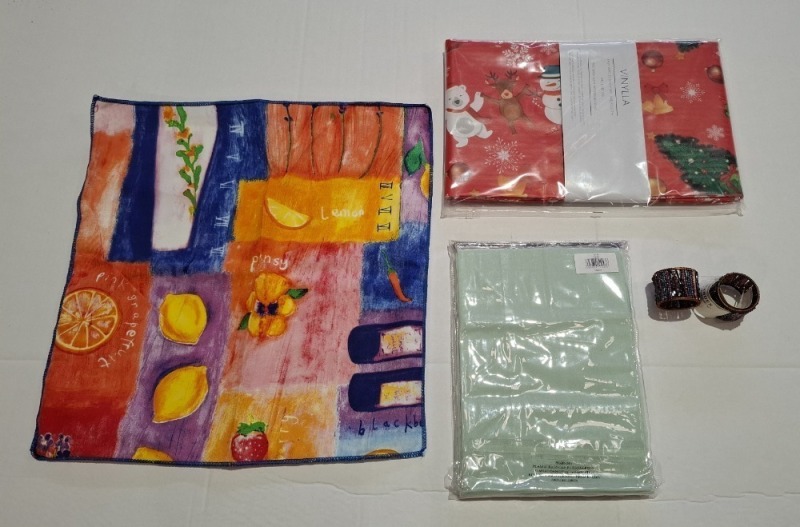 540 X BRAND NEW MIXED LOT CONTAINING 288 X PURPLE AND MIDNIGHT BEADED NAPKIN RINGS , 22 X SANTA VINYL TABLECLOTH 54 X 94 , 144 X ZEN JAPANESSE STYLE NAPKINS , 96 X NAVY POLYCOTTON NAPKINS IN 4 BOXES