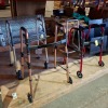 4 X TWO - WHEELED HEIGHT ADJUSTABLE WALKING AIDS IN RED , GREY AND BLACK / BRONZE