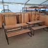 7 X MIXED LOT CONTAINING 2 X SET OF TABLE AND BENCH IN METAL / RUSTIC WOOD , 2 X INDUSTRIAL - STYLE GLASS TOP CONSOLE CHANGING ROOM TABLES WITH CLOTHING RAIL , 1 X SMALL WOOD / METAL TABLE - 5