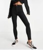 12 X BRAND NEW BRAND NEW WOMENS CLOTHING LOT IE. 4 X PAIRS OF HUGZ BLACK FAUX MID WAIST IN WINE AND BLACK IN SIZE 12L PLUS 8 X PAIRS OF TOPSHOP JEANS IN LIGHT BLUE AND NAVY IN SIZES UK 12 X 7, UK 10 X 1 TOTAL RRP &pound;488 - 2