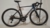 SCOTT ADDICT RC PRO DISC ROAD BIKE MODEL: 286415 SIZE: S - 52 ORIG PRICE: &pound;8699 ADDICT RC DISC HMX CARBON FRAME ADDICT RC HMX FORK ULEGRA 12 SPEED DI2 SHIFTERS ALL CARBON WHEELS CONTINENTAL GRAND PRIX 5000 S TYRES STEERERS HAVE BEEN CUT OUT (STANDARD PRAC