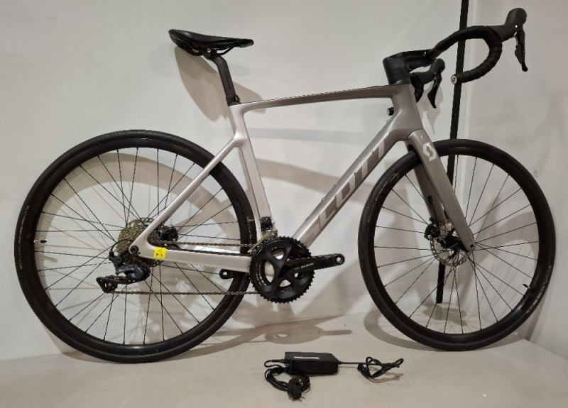 SCOTT ADDICT ERIDE 20 (EU) BIKE MODEL: 280749 SIZE: L ORIG RRP &pound;4599 ADDICT RC DISC HMX CARBON FRAME ADDICT ERIDE HMX FORK SHIMANO ULTEGRA/105 22 SPEED MAHLE MOTOR 40NM TORQUE, 460WH SYNCROS CAPITAL 2.0 25E WHEELS SCHWALBE PRO ONE TYRES SYNCROS CARBON/ALL