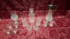 15 X BRAND NEW GLASSWARE TO INCLUDE 12 ASSORTED TUMBLER GLASSES OF VARIOUS DESIGNS 1 LARGE CUT GLASS JUG WITH METAL LID , 1 SQUARE CUT GLASS DECANTER , 1 SMALL GLASS VASE