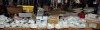 100 + MIXED LOT CONTAINING FIXED GU10 DOWNLIGHTS , PLUG IN CEILING ROSE , FUSE SWITCHES , ANSELL LIGHTING TWISTLOCK IP44 DOWNLIGHT , FALCON TRUNKING SYSTEMS LIMITED THROUGH BOX IN WHITE ETC ON 2 SHELVES