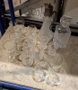 MISC LOT OF HOUSEWARES TO INCLUDE VARIOUS GLASSES AND BOWLS IN UNIQUE STYLES AND ANTIQUE STYLE FIGURE WITH A BANJO - STYLE BAROMETER WITH A THERMOMETER OVER 5 SHELFS - 5