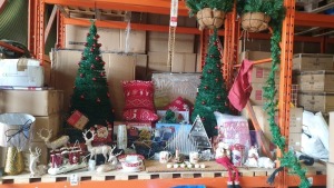 APPROXIMATELY 100 ITEMS IN A MISC CHRISTMAS LOT CONTAINING: CONE TREES, NOAL CHRISTMAS ORNAMENTS, HORNBY SANTA'S EXPRESS TRAIN, CHRISTMAS WORKSHOP DELUXE TRAIN SET, CHRISTMAS LIGHTS, SHATTERPROOF DECORATIONS, PILLOWS, REINDEER ORNAMENTS AND OTHER VARIOUS