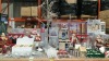 APPROX 140+ PIECE MIXED PREMIER CHRISTMAS LOT IE. FIBRE OPTIC TREES, LED CANAVAS, LARGE PULLS WITH BULBS, SET OF 3 LIT PARCELS, LARGE QUANTITY OF XMAS GLOVES AND VARIOUS HOUSE AND TREE DECORATIONS ETC.