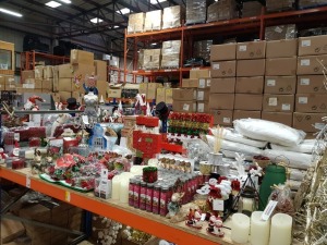 APPROX 225+ PIECE ASSORTED BRAND NEW PREMIER CHRISTMAS LOT CONTAINING VARIOUS SCENTICLES, LED CANDLES, REINDEER ORNAMENTS, LARGE WOODEN NUTCRACKER ADVENT CALENDAR, LARGE LED DECORATIONS, CHRISTMAS CUSHIONS, VARIOUS TREE AND HOUSE DECORATIONS ETC - ON ONE 