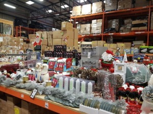 APPROX 300+ ASSORTED BRAND NEW PREMIER CHRISTMAS LOT CONTAINING VARIOUS SCENTICLES, LED PROJECTOR LIGHTS, 96M 1200 LED SUPABRIGHTS, TREE STAND, RIBBONS, LIGHTING ACCESSORIES, SANTA BELT LED TREE SKIRT, GLASS CANDLE HOLDER, VARIOUS HOUSE AND TREE DECORATIO