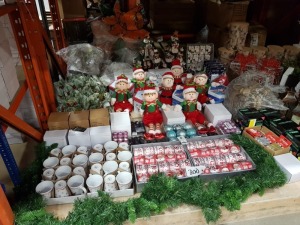 APPROX 300+ PIECE ASSORTED BRAND NEW PREMIER CHRISTMAS LOT CONTAINING 16 OUTDOOR CONNECTABLE FESTOON PARTY LIGHTS, RIBBONS, CHRISTMAS MUGS, SITTING PLUSH ELF, VARIOUS BAUBLES, KEYRINGS, GLITTER, VARIOUS TREE AND HOUSE DECORATIONS ETC