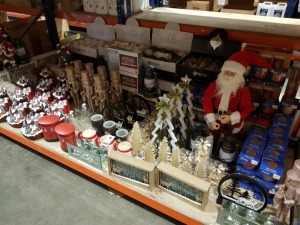 APPROX 320+ PIECE ASSORTED BRAND NEW PREMIER CHRISTMAS LOT CONTAINING LARGE QUANTITY OF QUALITY GLASS BAUBLES, STANDING SANTA, GLITTER STANDING NUTCRACKER, ANIMATED VILLAGE SCENE, 27 X 15CM LIT CHRISTMAS TABLE DECORATION, NOEL SIGNS, 10CM SCENTED FLICKER 