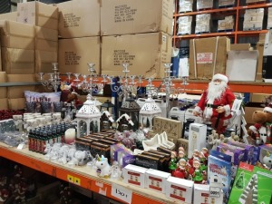 APPROX 150+ PIECE ASSORTED BRAND NEW PREMIER CHRISTMAS LOT CONTAINING LARGE STANDING MUSICAL SANTA, ELF ORNAMENTS, CHRISTMAS IN THE AIR SPRAY, GLASS LANTERNS WITH ANIMATED CHRISTMAS SCENES, CRACKERS CHRISTMAS FUMARE WINTER SPARKLE SCENTED CANDLE, SET OF 3