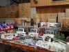 APPROX 200 PIECE ASSORTED BRAND NEW PREMIER CHRISTMAS LOT CONTAINING WARM WHITE STATIC MICRO BRIGHTS, 50 LED WIRE LIGHTS WITH TIMER, ANIMATED VILLAGE SCENE, CHRISTMAS SCENES, CANDLES, DECORATIVE LIGHT UP TWIGS, STANDING MINI LIGHT UP CHRISTMAS TREES, VARI