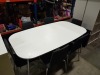 1 X BEIGE COLOURED OVAL TABLE WITH 6 X GREY FABRIC CHAIRS