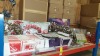 APPROX 100+ PIECE MIXED PREMIER LOT CONTAINING CHRISTMAS TISSUES, WINTER WREATHS, CHRISTMAS THEMED CUSHIONS AND DECORATIVE TREE TOPPERS ETC