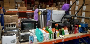 LARGE MIXED LOT CONSISTING OF - 2 X MICROWAVES, 2 X COFFEE MACHINES, 4 X TOASTER'S, 1 X BIN, 1 X TABLE TOP OVEN, 1 X TITAN HOOVER & APPROX 50 X MIXTURE OF AFTER SUN, DEEP TANNING LOTION, MR SHEEN ETC.. - CONTAINED ON FULL BAY
