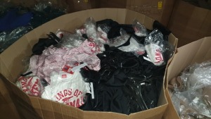 FULL PALLET OF BRAND NEW CLOTHING I.E TOPSHOP DRESSES IN BLACK AND PINK SIZES UK 12 14 16 AND ARSENAL T SHIRTS