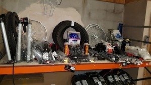 APPROX 100 X MIXED PUSH BIKE ACCESSORIES TO INCLUDE - TOUGH TERRAIN TYRES, BIKE CLEANER, SPOKES, (COYOTE SPORTS) FOOT PUMP, MUD GUARDS, SEAT'S, CRASH HELMET ETC - CONTAINED ON FULL BAY
