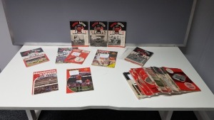 APPROX 75 X MANCHESTER UNITED PROGRAMMES WITH TOKENS IN GOOD CONDITION RANGING FROM 1950'S - 1970'S