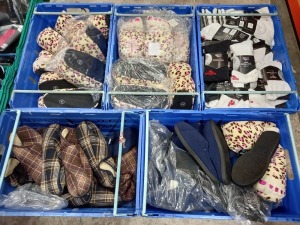 5 TRAYS (NOT INCLUDED) OF VARIOUS ITEMS OF CLOTHING IE FLAT CAPS, BLUE SLIPPERS, LEAPARD PRINT SLIPPERS AND GOLA SOCKS ETC