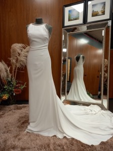 1 X (PRONOVIAS BARCELONA) WEDDING DRESS LABEL - 61100001.854 DRESS COLOUR - IVORY SIZE - UK10 LONG DRAPE. NOTE: SMALL MARK ON BACK