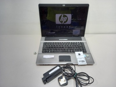 HP 67205 LAPTOP WITH CHARGER AND WINDOWS VISTA BUSINESS