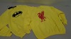 50 PIECE CLOTHING LOT CONTAINING YELLOW BATMAN JUMPERS AND YELLOW LIVERPOOL JUMPERS