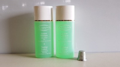 64 X BRAND NEW CLARINS PARIS TONING LOTION (ALCOHOL-FREE WITH IRIS COMBINATION OR OILY SKINS) - 50ML