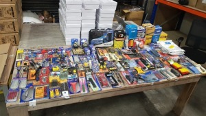 TABLE CONTAINING LARGE QUANTITY OF ASSORTED TOOLS IE BIT SETS, TAPE MEASURE, EXTENSION BAR SET, WATER PUMP, DRILL BITS, COMBINATION SPANNER SET, 10PC METRIC HEXAGON KEY SET, VARIOUS OTHER SMALL TOOL SET AND TOOLS.