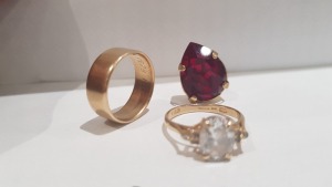 3 PIECE LOT CONTAINING 1 X 14K GOLD RING WITH CLEAR STONE, 1 X GOLD COLOURED RING AND 1 X GEMSTONE STYLED STONE.