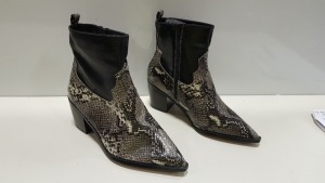 12 X BRAND NEW BAGGED TOPSHOP WF BLISS HEELED BOOTS IN BLACK AND SNAKE PRINT. (SIZE UK 7)
RRP £40.00 (TOTAL £480.00)