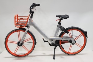 2 X SLIGHTLY DAMAGED ORANGE & SILVER CITY / CAMPING BICYCLES - ROBUST ALUMINIUM 19 X 48 FRAME, SOLID PUNCTURE PROOF 24 TYRES, DYNAMO BUILT INTO FRONT WHEEL HUB, INTEGRATED BRAKE CABLES, COMPLETE WITH FRONT BASKET. PHOTOS ARE A REPRESENTATION OF TYPE OF FA