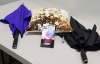 188 PIECE ASSORTED LOT CONTAINING 144 X MIRR'A'DISH ICE BIRD TOY, 18 X UMBRELLAS AND 26 X PARLANE CUSHIONS.
